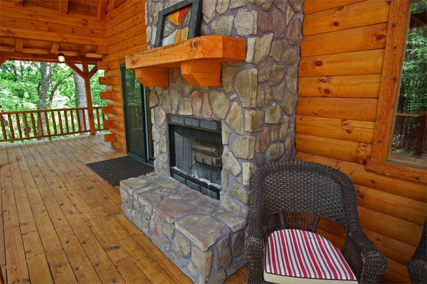 stone fireplace on deck
