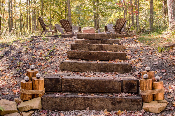railroad steps leading to firepit area, seating