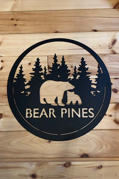 Cabins by the Caves Bear Pines Cabin sign