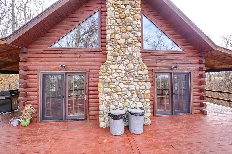 exposed stone covered chimney