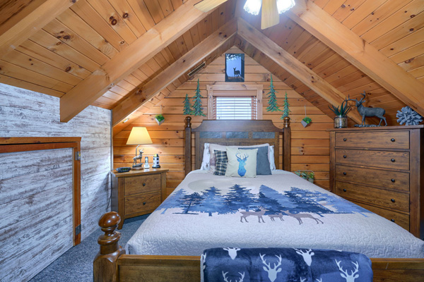Quaint and comfortable log cabin bedroom