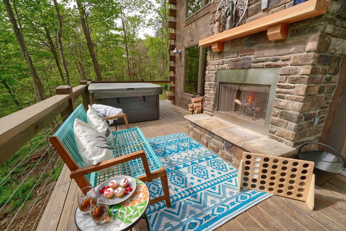 bench on deck with fireplace
