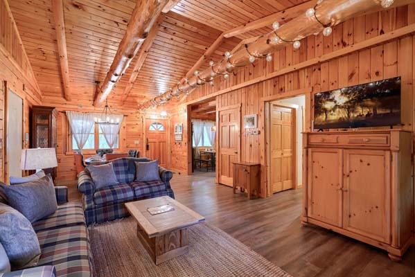 nviting log cabin space with comfortable seating