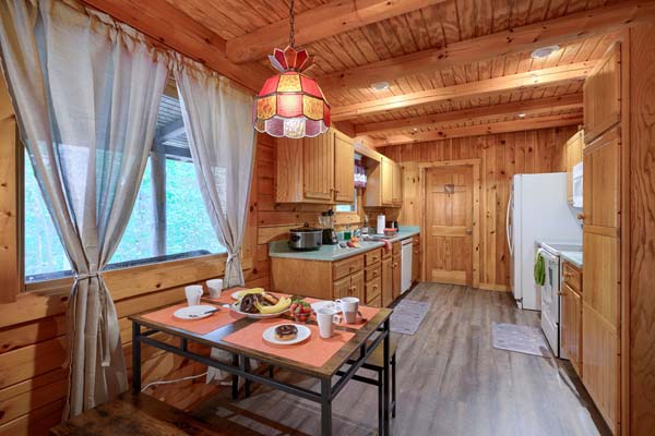 Charming log cabin dining room with rustic decor