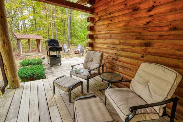 Cozy log cabin porch perfect for relaxation