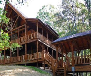 csbin in wood, 2 story wrap around deck