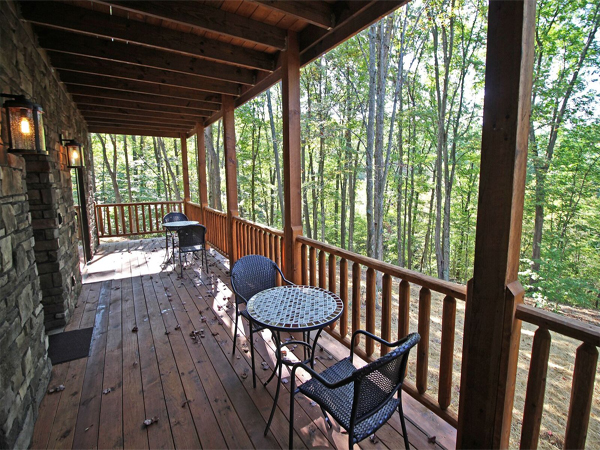 tables and chairs against deck railing