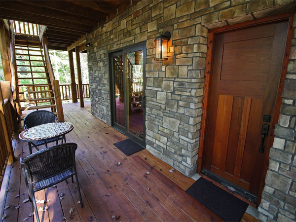covered porch on log cabin