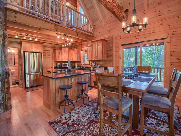 Warm and rustic log cabin kitchen space
