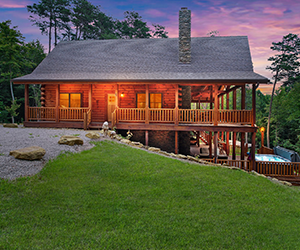 log cabin with side deck and jacuzzi