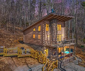 two story cabin, two large decks with winding steps