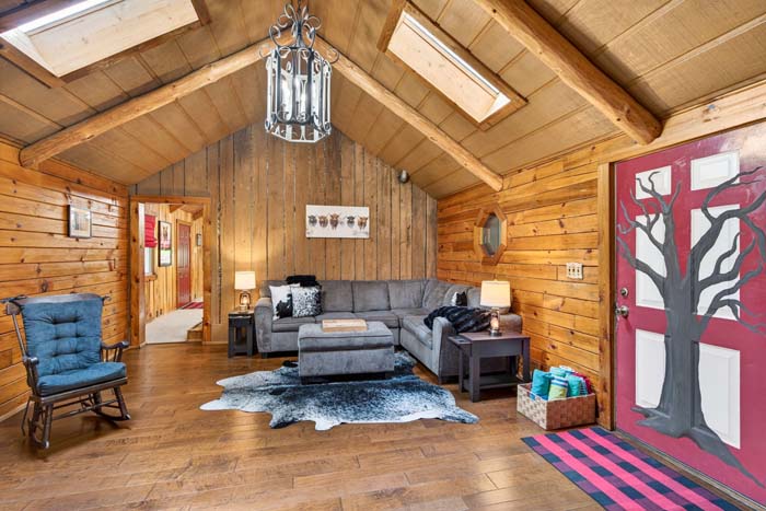 Warm cabin living room with cozy seating
