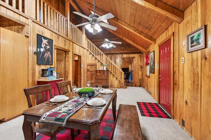 Inviting cabin exterior with wooded views