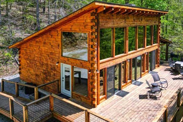 Relaxing porch with nature views at Olde Homestead Cabin