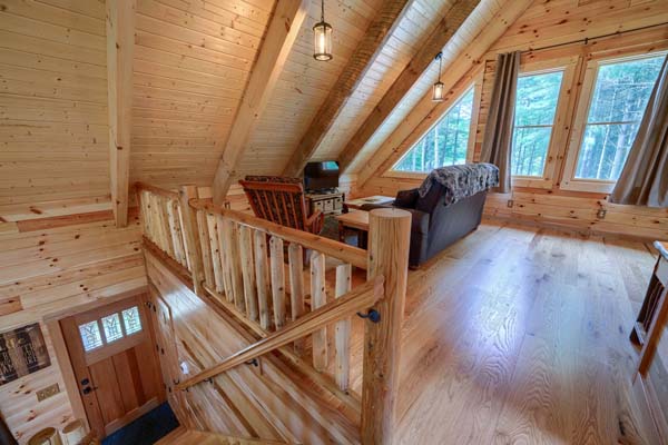 Tranquil escape in the log cabin bedroom