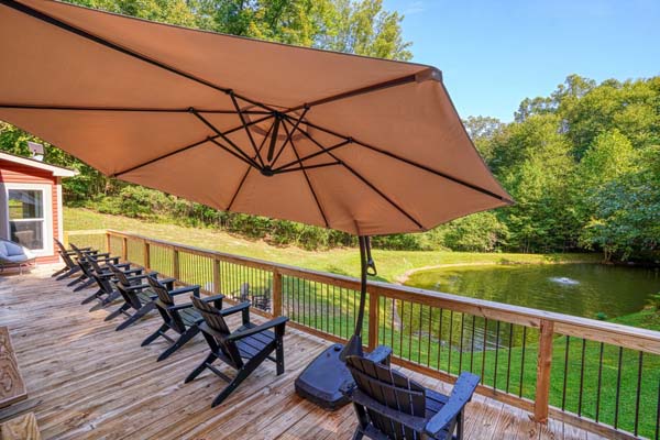 lound seating on deck with umbrella