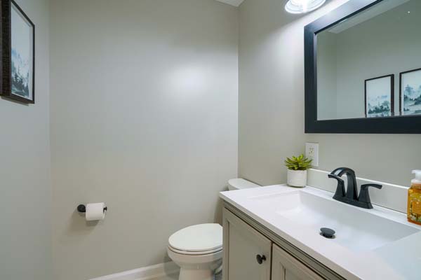 bathroom with white sink top