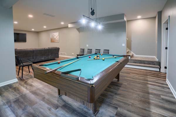 game room with pool table and overhead lighting