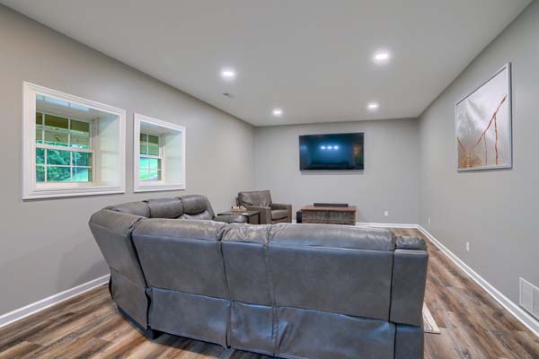 gray sectional in game room