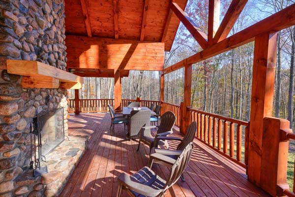 Nature-inspired log cabin deck with breathtaking views