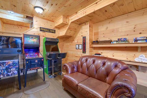 arcade games and leather couch