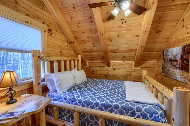Comfort and tranquility in the log cabin bedroo