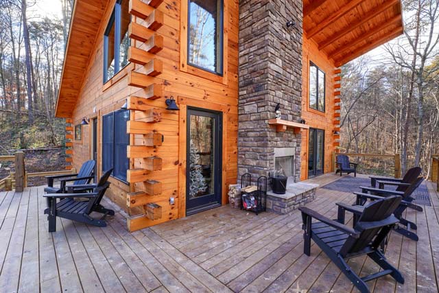 Scenic log cabin deck overlooking nature