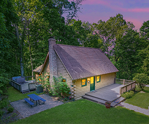 front view of lodge with cover porch