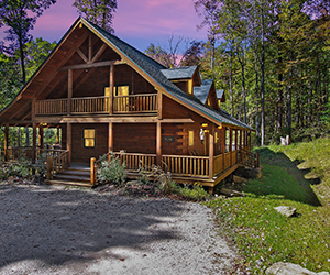 lodge with open porch and wrap around deck