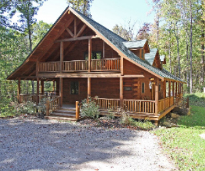 lodge with open porch and wrap around deck