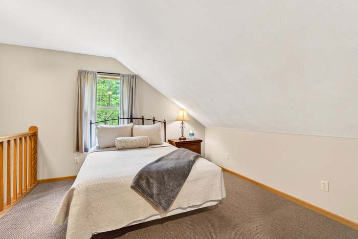 Upper level king bedroom in cabin