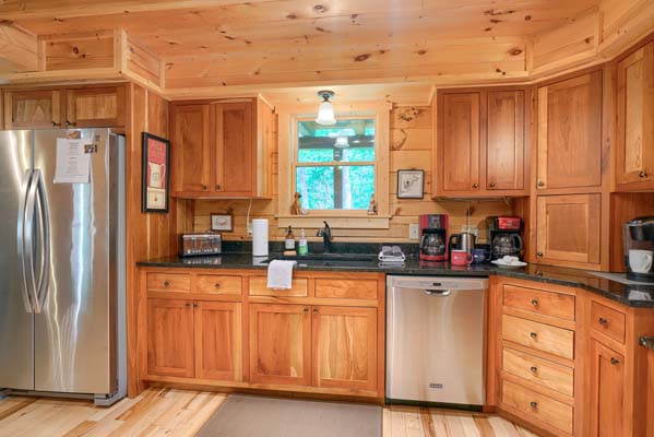 Warm and inviting log cabin kitchen