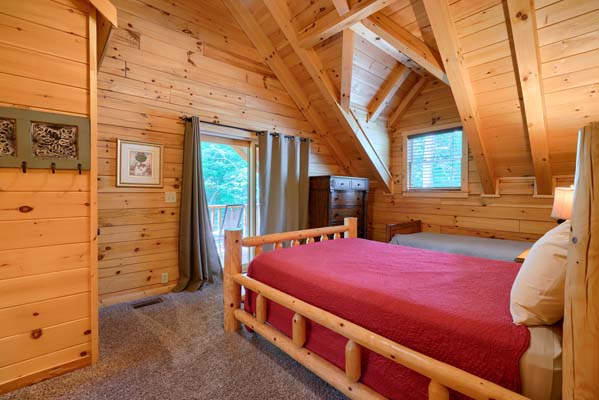 Cozy haven in the log cabin bedroom