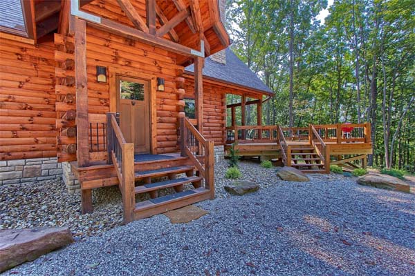 front of log cabin