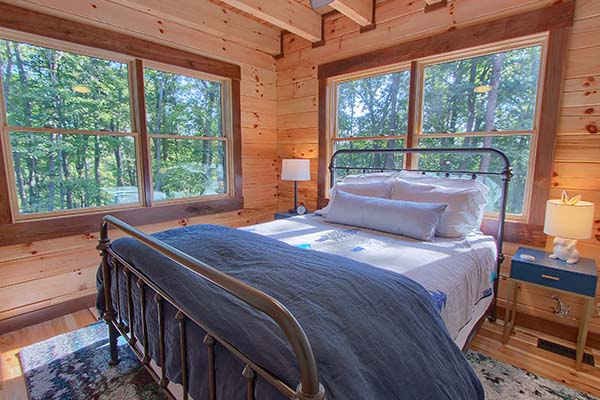 Serene ambiance of the log cabin bedroom