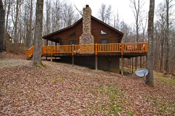 log cabin with wrap around deck