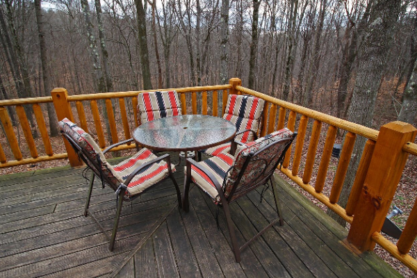 Cozy log cabin deck for outdoor relaxation
