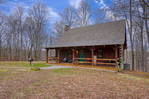 front of log cabin
