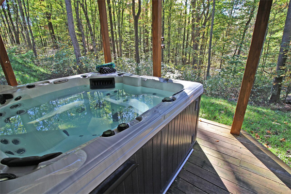 view of woods from hot tub