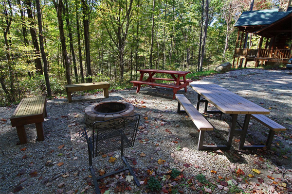 firepit with picnic tables