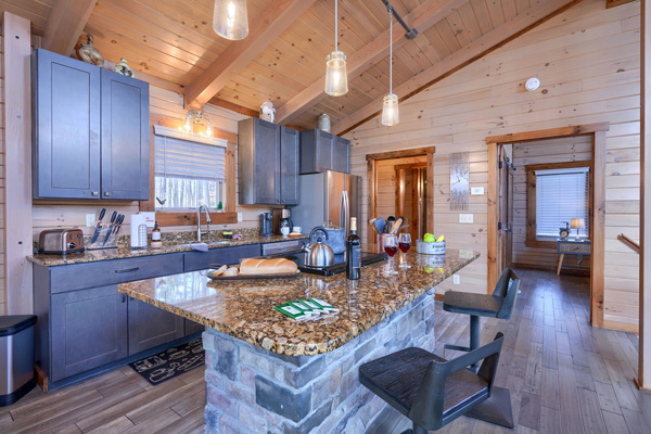 Traditional log cabin kitchen with wood accents