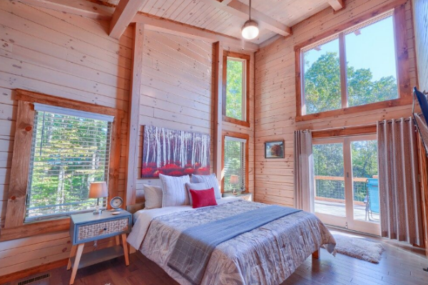 1st floor bedroom with King bed and sliding doors to the deck