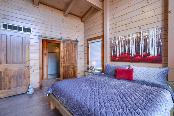 Cozy haven in the log cabin bedroom