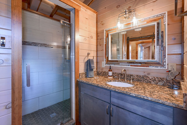 Inviting log cabin bathroom with rustic features