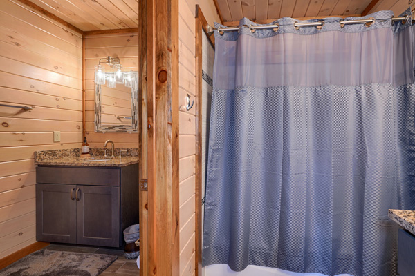 Relaxing log cabin bathroom with nature-inspired elements